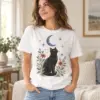 Black Cat Moonlight Unisex Graphic T-Shirt — lifestyle illustrative mockup